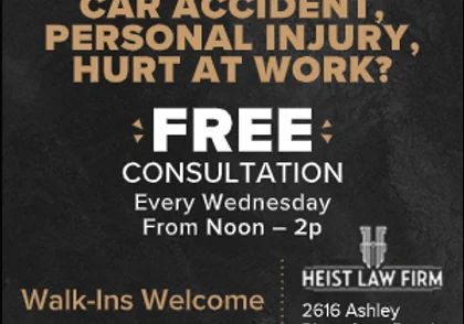 A black and white advertisement for a personal injury law firm.